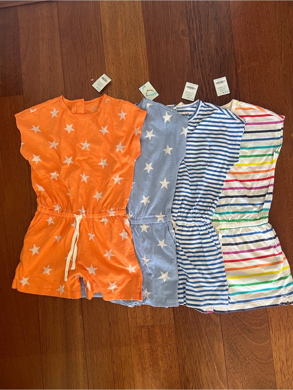 Lot- NWT New Primary Kids Rompers- 8/9- Rainbow Stripe, Blue Orange Stars